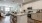 a kitchen with white cabinets
